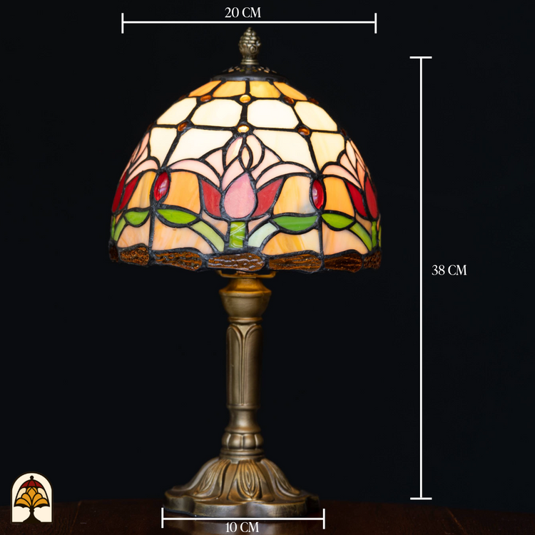 Elegante Tiffany-stijl tafellamp met rood- en roze tulpdesign van echt glas-in-lood. Hoogte 38 cm, kapdiameter 20 cm, voetdiameter 10 cm. Brengt warmte en karakter in elk interieur.